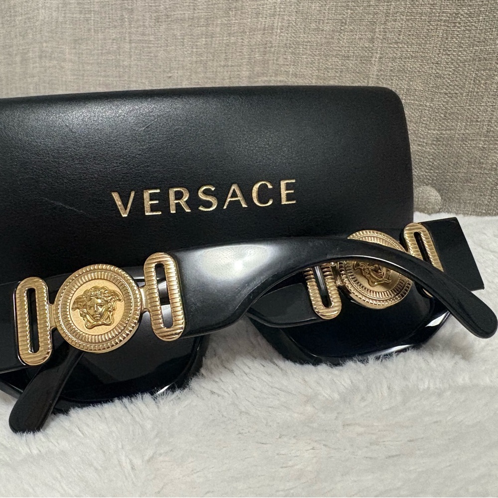 Versace glasses,black and gold with the original Versace case